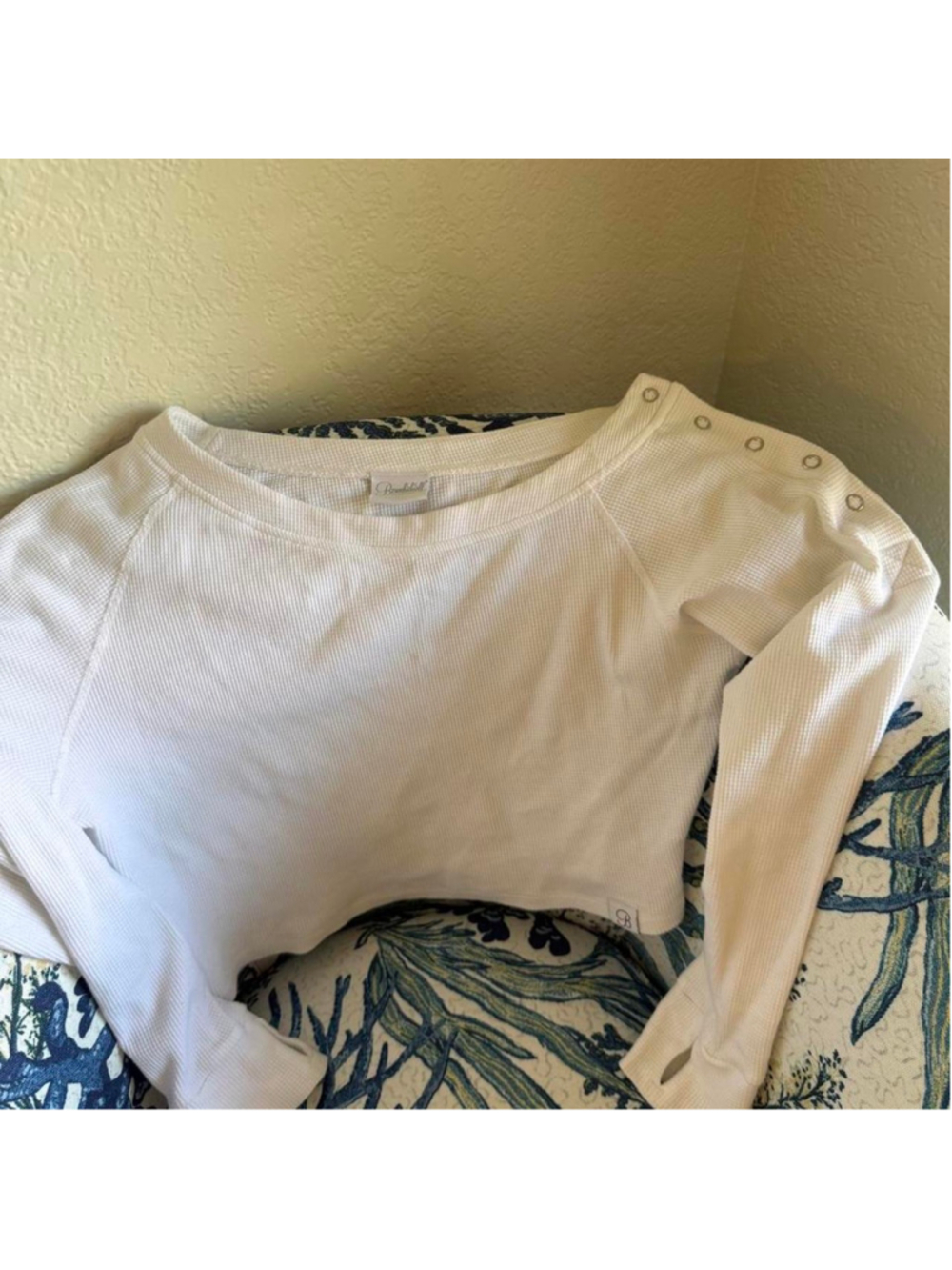 Bombshell allure pullover 

white long sleeve crop top with button detail

 #bom